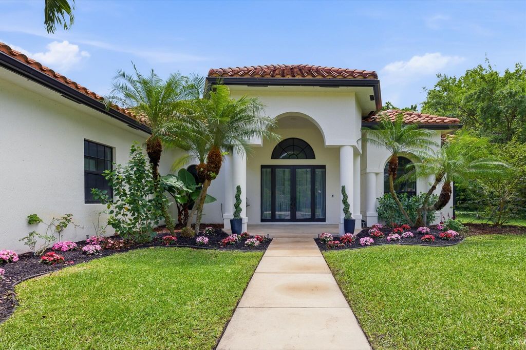 Photo of 8717 Estate Drive, West Palm Beach, FL 33411 (MLS # B26014139)