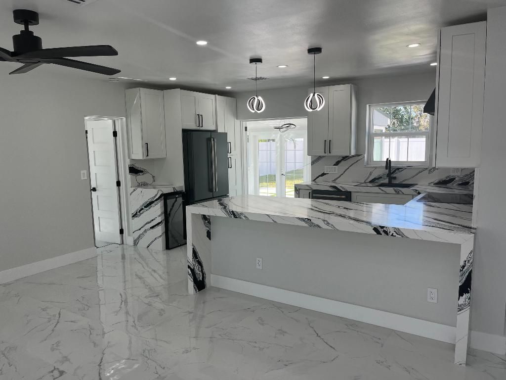 Photo of 355 Maddock St, West Palm Beach, FL 33405 (MLS # R11148987)