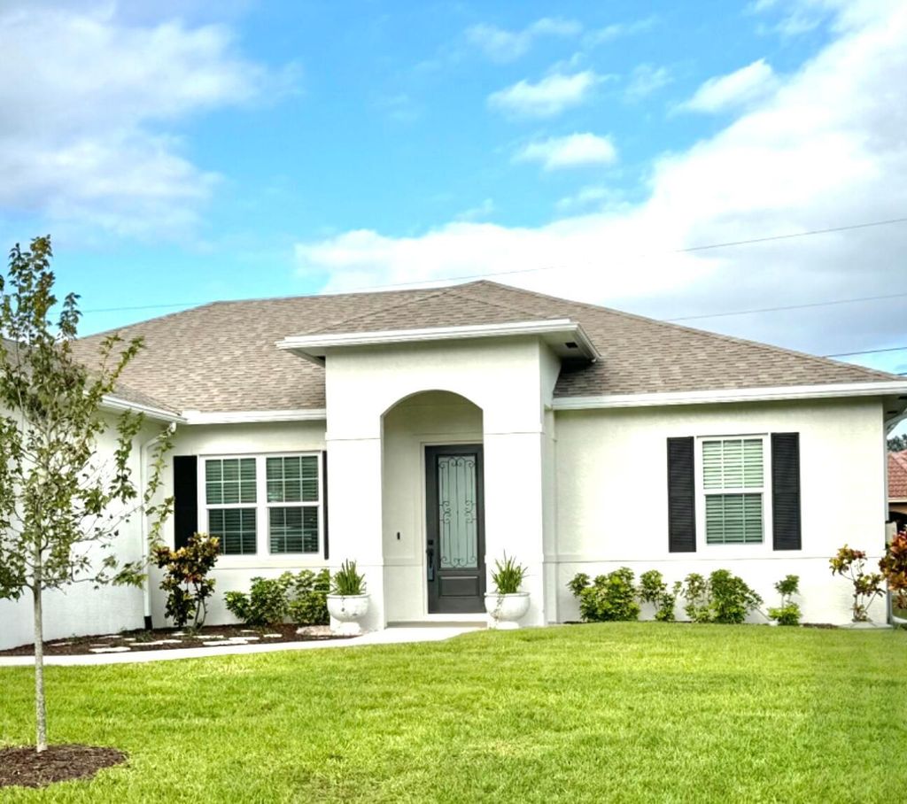 Photo of 1719 SW Bradway Lane, Port Saint Lucie, FL 34953 (MLS # R11014810)