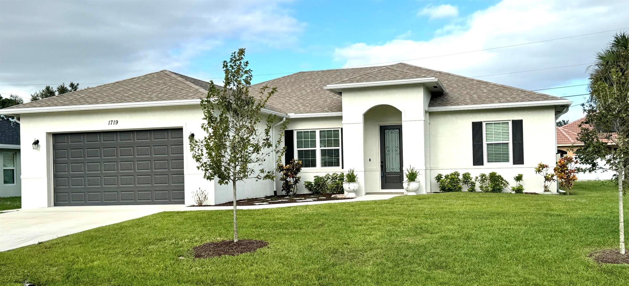 Luxurious open-concept home with large ''Private'' covered patio in up & coming PSL & 30 min. to beach! Available NOW! This newly built 4/2, 2-car garage is located in a quite and family-friendly neighborhood. Minutes from shops, restaurants & easy access to I-95. Interior offers generous & bright living space. Kitchen features soft-close cabinetry, quartz countertops, food pantry & new ''EE'' appliances. The primary ''private'' suite has dual walk-in closets, dual sinks, water room, oversized tub & walk-in shower with bench. 3Bdr additional rooms offer flexible options as bedrooms, offices or gym. Home Offers: Low-Energy Costs, Lawn Care, Impact Glass, W&D & Home Maintenance. Tenant responsible for water & power. Pet friendly! Background Check & min 620 Credit Score, outdoor smoking only