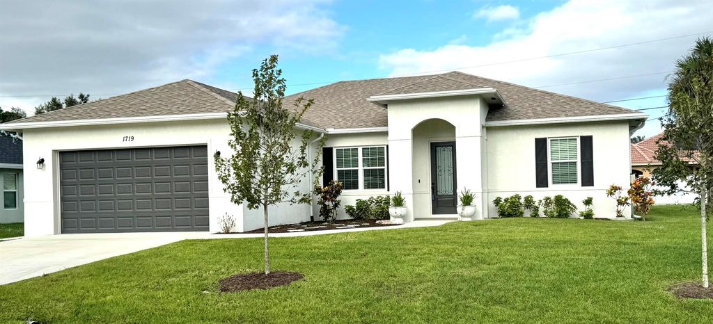 Photo of 1719 SW Bradway Lane, Port Saint Lucie, FL 34953 (MLS # R11014810)