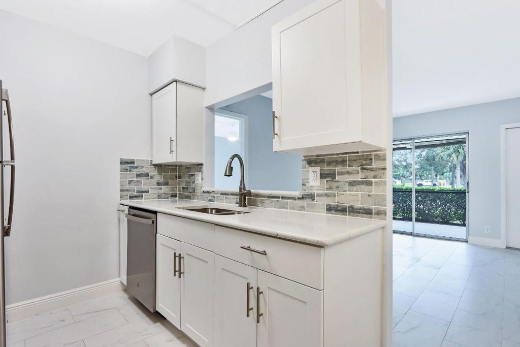 Photo of 6313 Chasewood Drive #B, Jupiter, FL 33458 (MLS # R10951434)