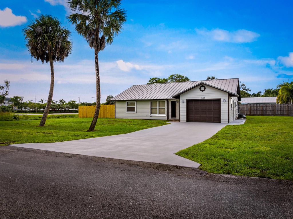 Photo of 1627 SE Monroe Street, Stuart, FL 34997 (MLS # R11123783)