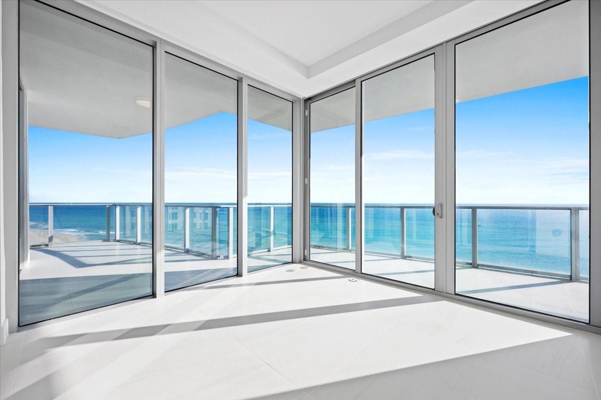 The Amrit Ocean Resort and Residences on Singer Island in the Palm Beaches offers a luxurious oceanfront living experience. The newly developed beachfront property features spectacular sweeping ocean views, floor-to-ceiling glass doors, 10-foot ceilings, a wet bar, and contemporary fixtures and finishes. The units include 2 bedrooms, 2.5 baths, plus a den, and a custom European kitchen. Enjoy daily tranquility from a 590 sq. ft wrap-around balcony with breathtaking ocean views. At your convience sits a 100,000 sq foot state of the art health and wellness facility, two gyms, a yoga terrace, four on-site restaurants, full beach and pool services. A perfect place for those seeking a blend of luxury and wellness. In process of being furnished and will consider a lease purchase.