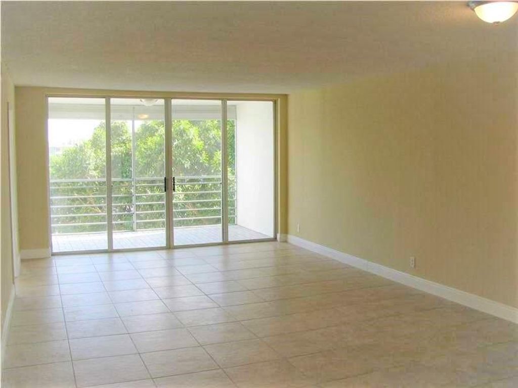 Photo of 2940 N Course Drive #604, Pompano Beach, FL 33069 (MLS # B26014123)