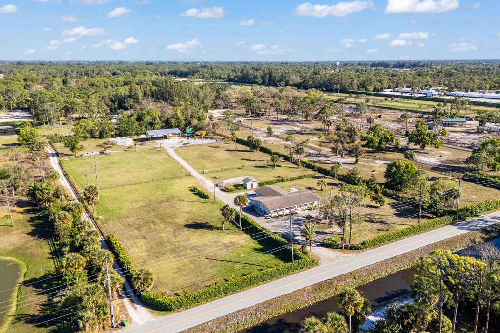 Photo of 1216 C Road, Loxahatchee Groves, FL 33470 (MLS # R11161369)