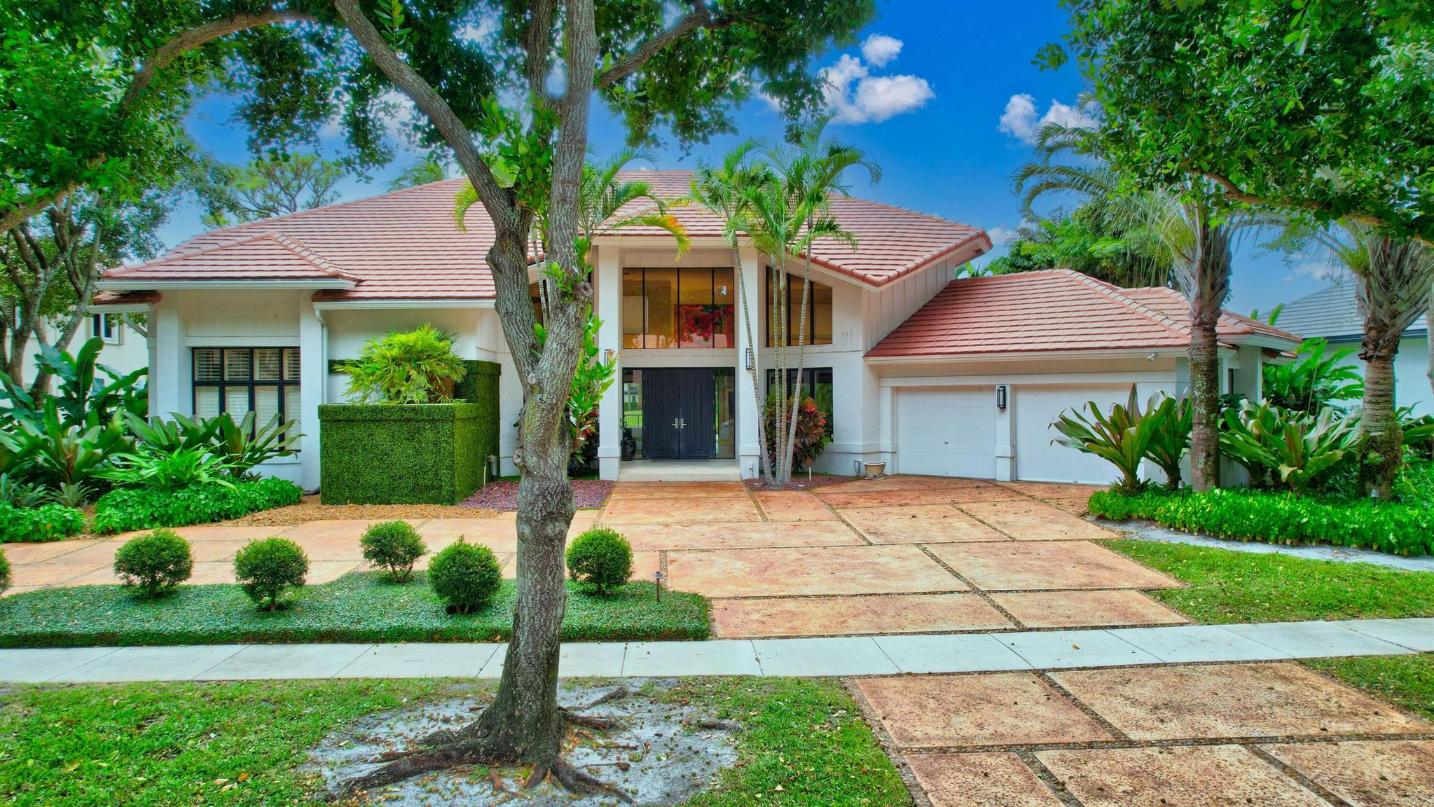 Step into this stunning custom, contemporary designer home and prepare to be captivated. This residence exudes the essence of a resort-like oasis, boasting a perfect blend of family-friendly spaces, entertainment areas, and intimate corners. Located on an oversized lot, the heart of this home is the incredibly spacious living room, which seamlessly flows into oversized backyard with captivating lake views.The expansive kitchen features a generously sized granite eat-in island and a separate dining space that overlooks the pool and lake. This culinary haven is equipped with top-of-the-line GE Monogram appliances, a Bosch dishwasher, a spacious 36'' wide, stainless steel refrigerator, and a matching 36'' wide, stainless steel freezer.READ MORE....