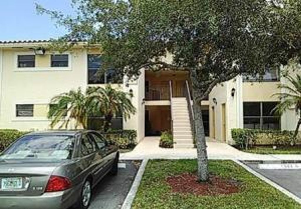 Photo of 1522 Lake Crystal Drive #F, West Palm Beach, FL 33411 (MLS # B26045515)