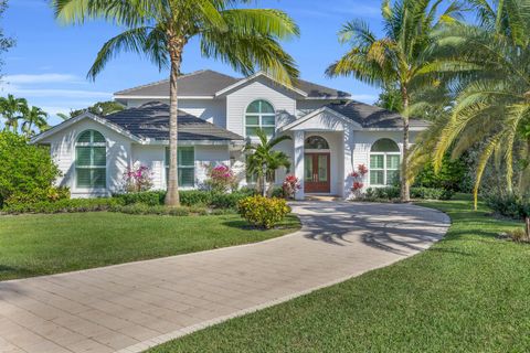 Photo of 18406 SE Lakeside Drive, Tequesta, FL 33469 (MLS # R11136604) Photo of 18406 SE Lakeside Drive, Tequesta, FL 33469 (MLS # R11136604)