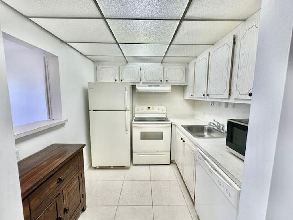 Photo of 55 Fanshaw Dr, Boca Raton, FL 33434 (MLS # B26011998)