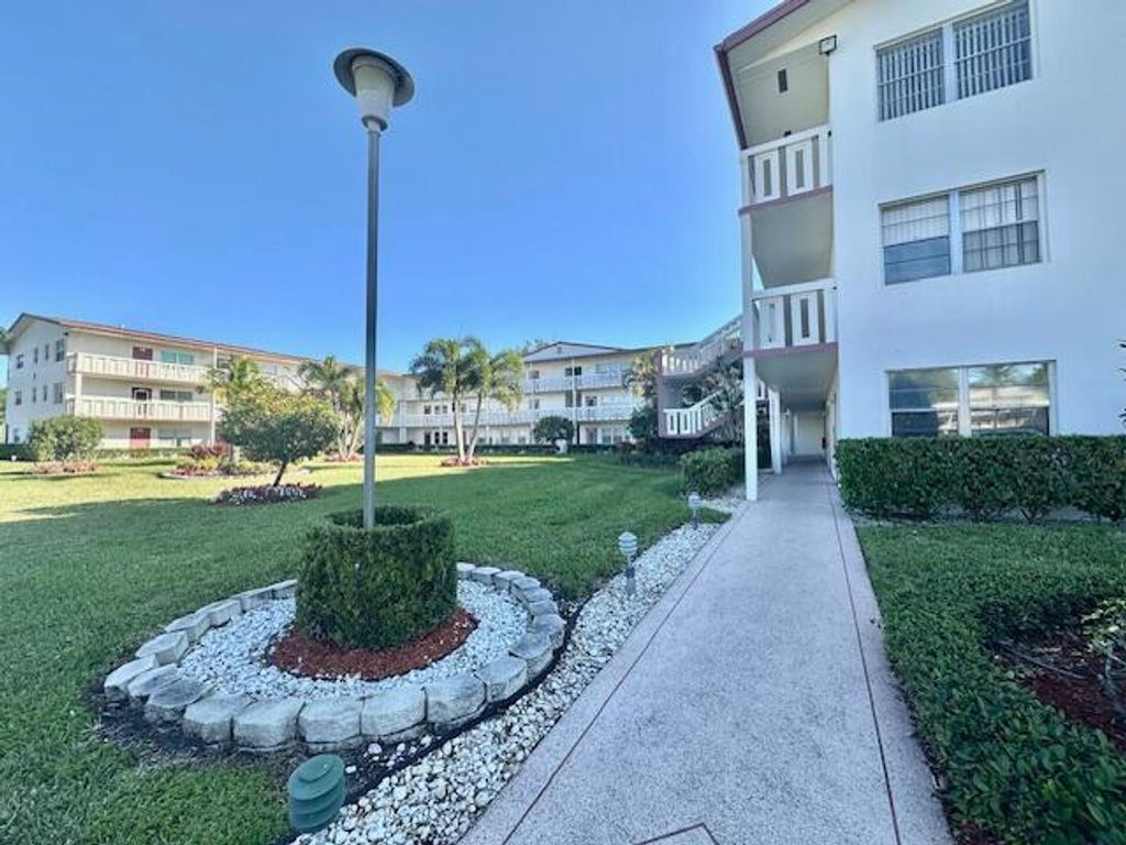 Photo of 55 Fanshaw Dr, Boca Raton, FL 33434 (MLS # B26011998)