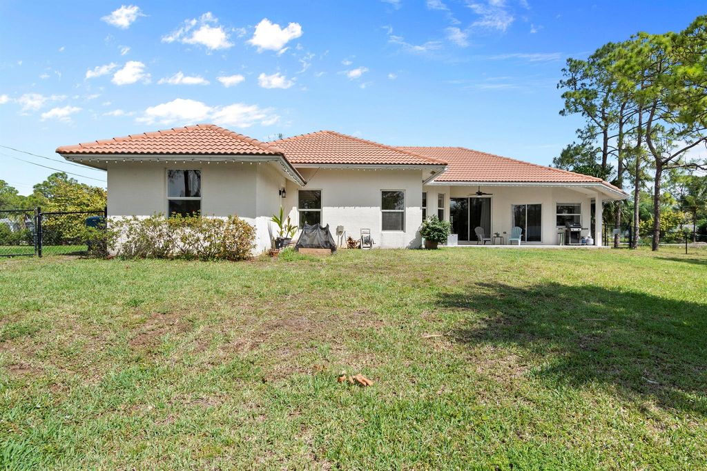 Photo of 11290 51st Court N, West Palm Beach, FL 33411 (MLS # R11073069)
