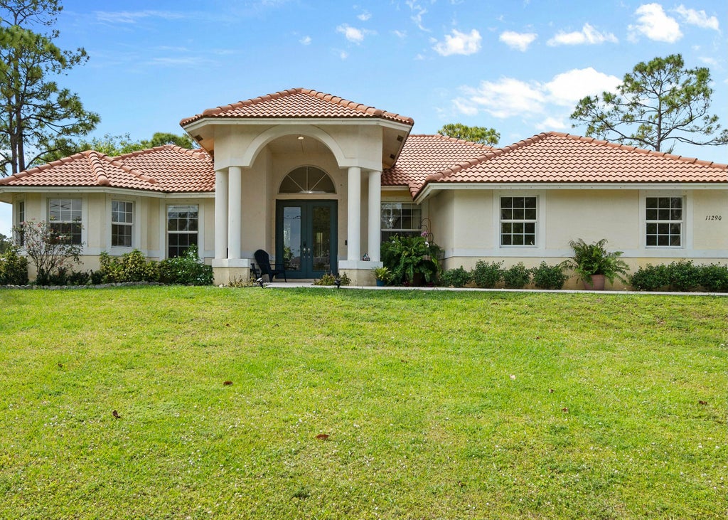 Photo of 11290 51st Court N, West Palm Beach, FL 33411 (MLS # R11073069)