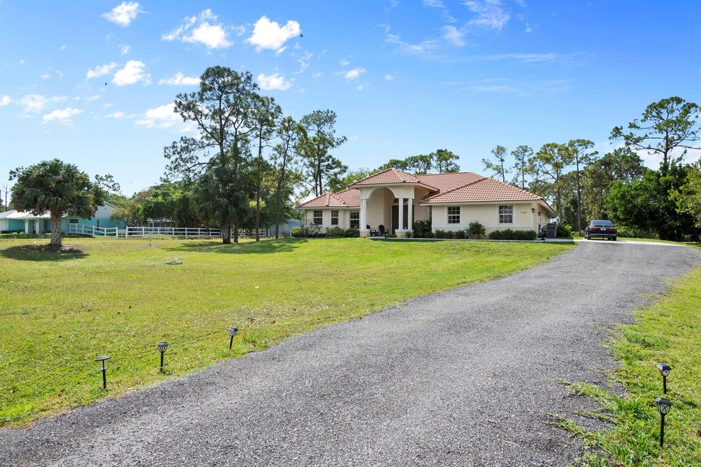 Photo of 11290 51st Court N, West Palm Beach, FL 33411 (MLS # R11073069)