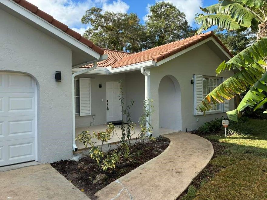 Stunning 4-bedroom, 2-bath residence located in the heart of Coral Springs. The home features tile flooring throughout, a modern kitchen and updated bathrooms, and stylish recessed lighting that enhances the bright, open feel of the living spaces. Enjoy outdoor living in the large backyard with a sparkling pool—perfect for entertaining or relaxing. Additional highlights include a 2-car garage and a well-designed layout ideal for comfortable family living.