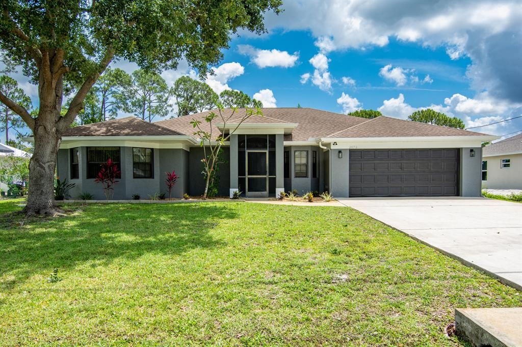 Photo of 2873 SW Collings Drive, Port St Lucie, FL 34953 (MLS # R10885466)