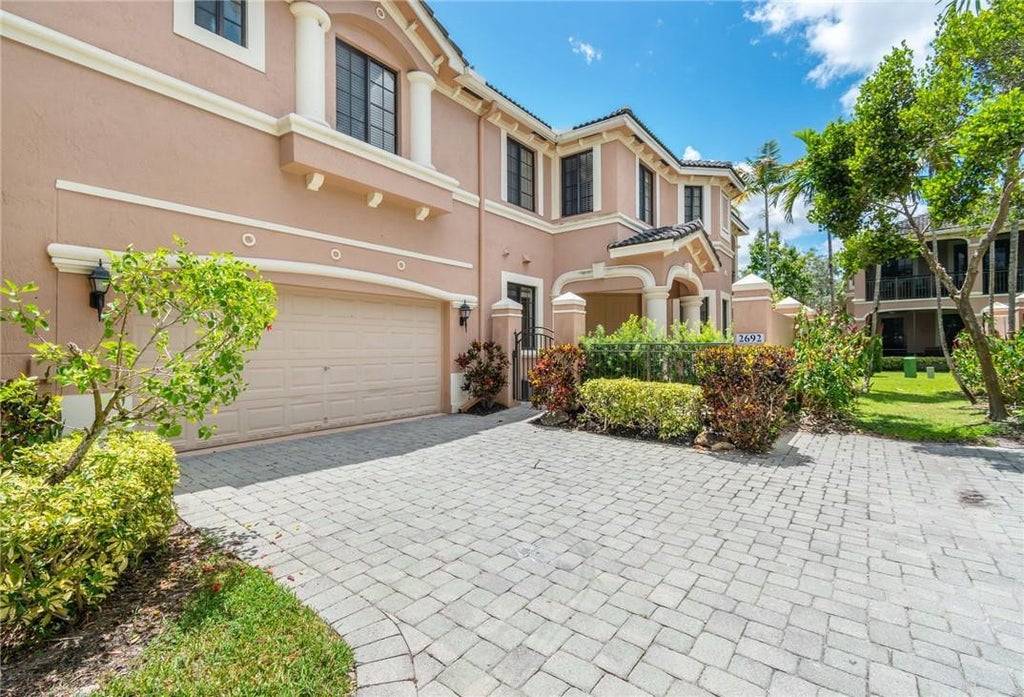 Photo of 2692 Center Ct Drive #2-32, Weston, FL 33332 (MLS # B26038109)