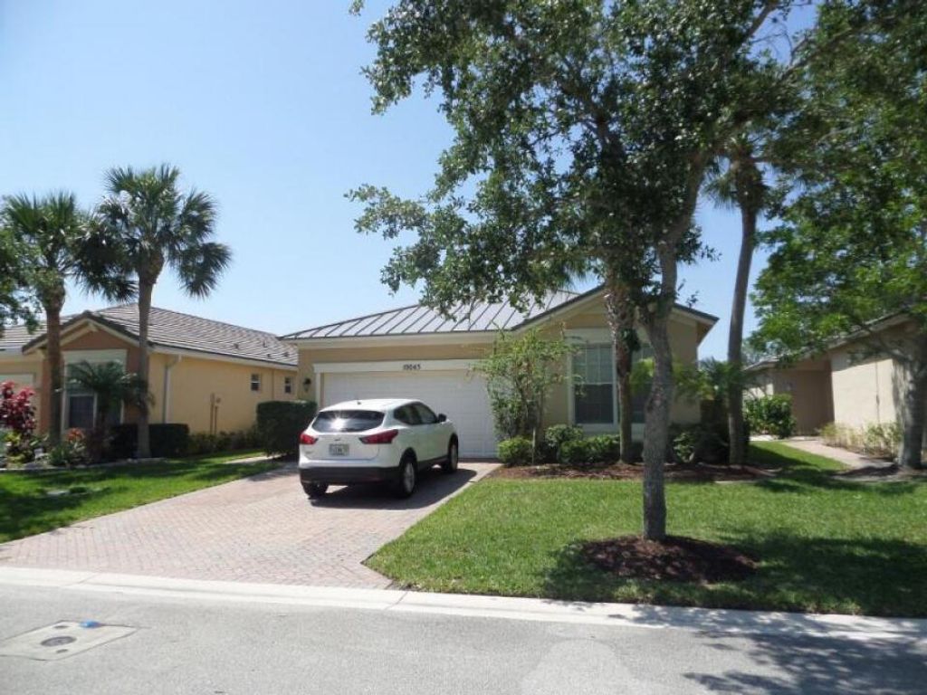 Photo of 10045 SW Brookgreen Circle, Port St Lucie, FL 34987 (MLS # R10888041)