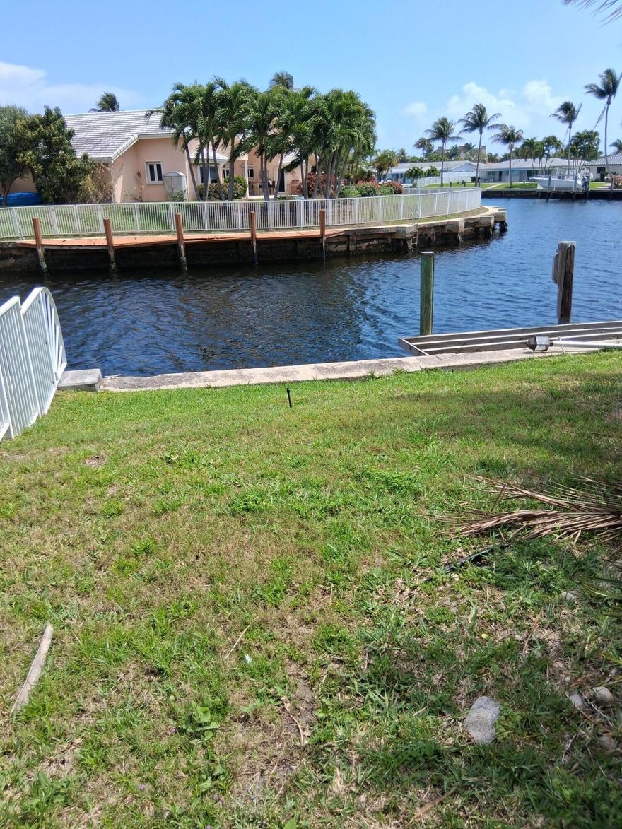 This 3 Bedroom cul-de-sac home on water nestled in a wonderful neighborhood.  Home has not been updated and requires TLC. Front entry door to be replaced by seller. One fixed bridge at Federal Hwy approximately 14 feet clearance at low tide.