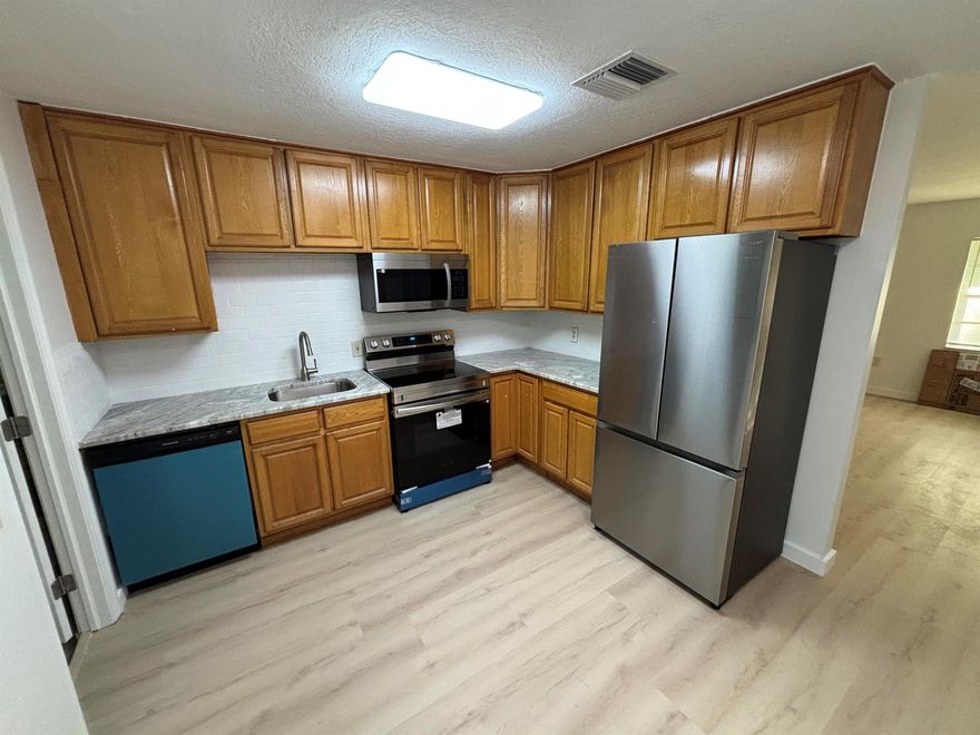 Completely renovated duplex unit in Fort Pierce! This 2 bedroom, 1 bathroom unit has been fully updated with fresh interior finishes throughout. The kitchen features brand-new appliances, offering a modern and functional space. Bright bedrooms, a renovated bathroom, and updated living areas make this unit move-in ready. Very secluded, dirt road access just west of town. Conveniently located near schools, shopping, and major roadways. Application required via Rentspree. FPL electric/Septic. Not fully fenced