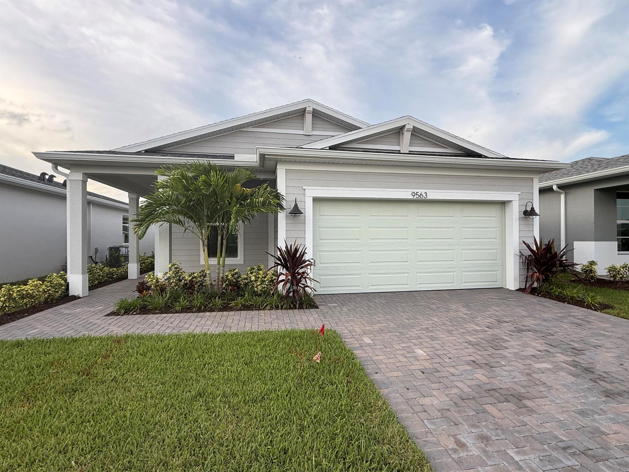 This brand-new Aspen offers 1,723 sq. ft. of modern comfort. 2-bed, 2-bath home with a versatile flex space for work or hobbies. The owner's suite features a large walk-in closet and overlooks a spacious lanai. The Kenley community in Port Saint Lucie, Florida, offers several amenities to its residents. Clubhouse - A central gathering place for community events and activities. Community Pool - A resort-style swimming pool perfect for relaxation and recreation with jacuzzi. Fitness Center - A state-of-the-art gym for residents to stay healthy and active. Social Room - A space for community events, parties, and gatherings and Grilling Station - An outdoor cooking area for residents to enjoy. Lawn care, cable and internet are included in the rent.