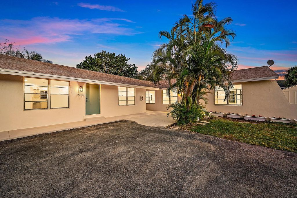 Photo of 1928 Service Road, North Palm Beach, FL 33408 (MLS # R11165440)