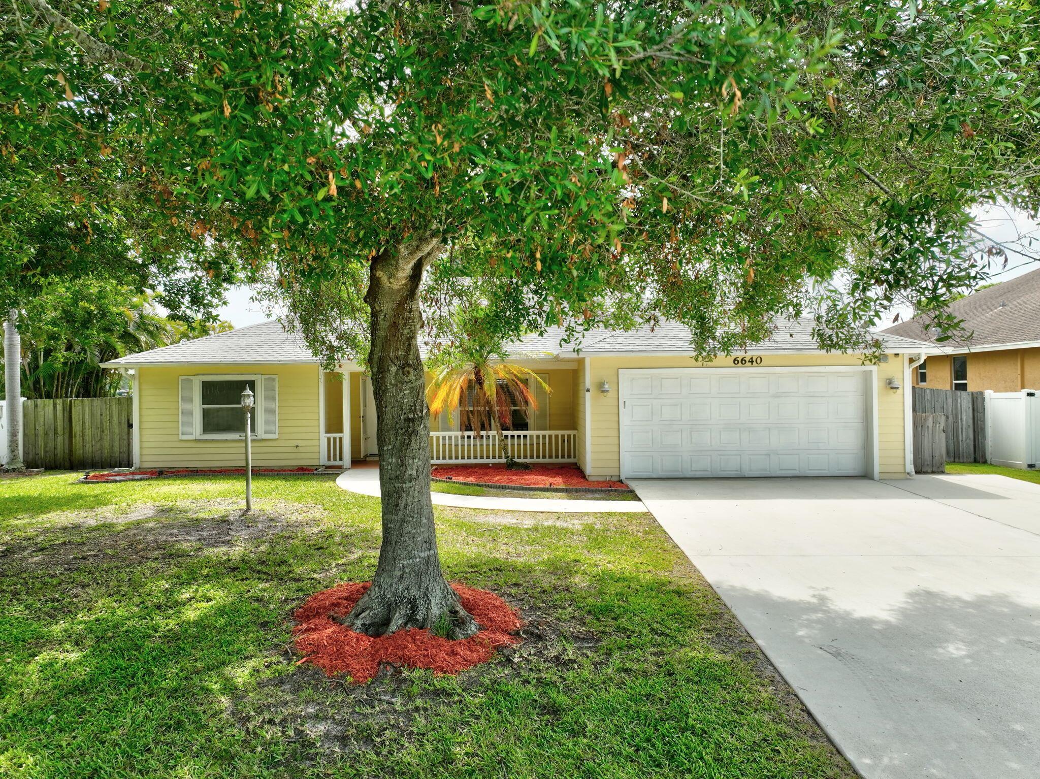 Spacious, move-in ready, split bedroom plan, Key West style home. New roof 2024. This home offers double poured concrete with Hardie Plank siding, engineered wood floors, tile in main area, granite countertops, stainless steel appliances & spacious primary bath. Hurricane panels, A/C 2019. Mature landscaping, large permitted metal shed for storage. Fully fenced backyard, Excellent, peaceful neighborhood. Close to golf course, shopping, restaurants, etc.