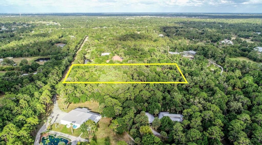 Photo of 4921 SW Corsair Avenue, Palm City, FL 34990 (MLS # R10983398)