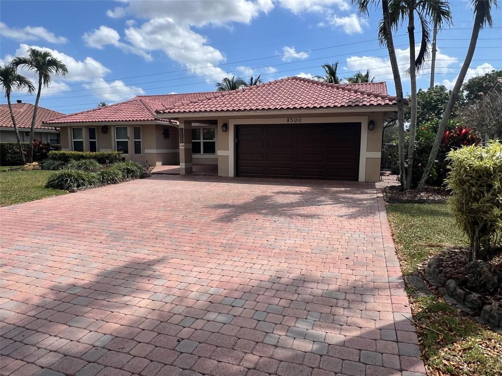 Photo of 8500 NW 47th Drive, Coral Springs, FL 33067 (MLS # F10496887)