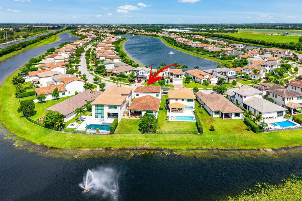 Photo of 9027 Grand Prix Lane, Boynton Beach, FL 33472 (MLS # B26033661)