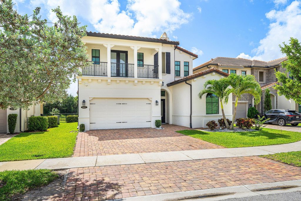 Photo of 9027 Grand Prix Lane, Boynton Beach, FL 33472 (MLS # B26033661)