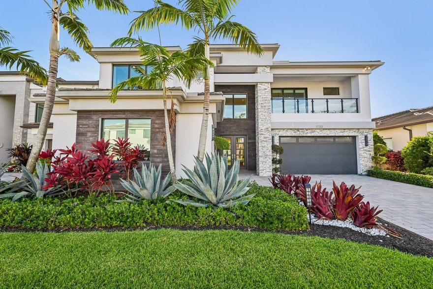 Welcome to 17313 Pagoda Palms Dr in the sought-after LOTUS community of Boca Raton. This stunning 5-bedroom Sumatra model was one of the original model homes, showcasing top-tier upgrades, designer finishes, and exceptional attention to detail throughout. From the thoughtfully designed layout to the high-end touches, every space reflects quality and style. Enjoy spacious, modern living in a home that truly stands out. A rare opportunity to own a former model home in one of Boca's premier communities.