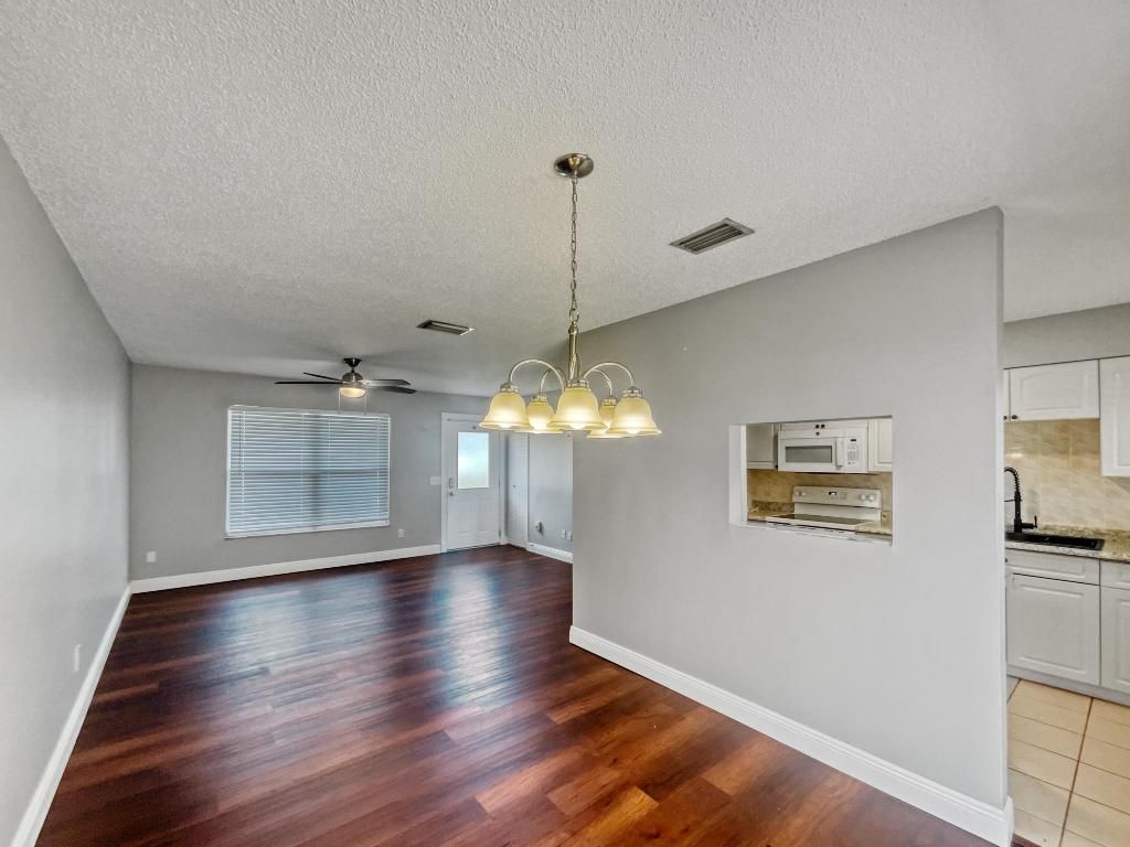 Photo of 838 SW Curtis Street, Port Saint Lucie, FL 34983 (MLS # R10969689)