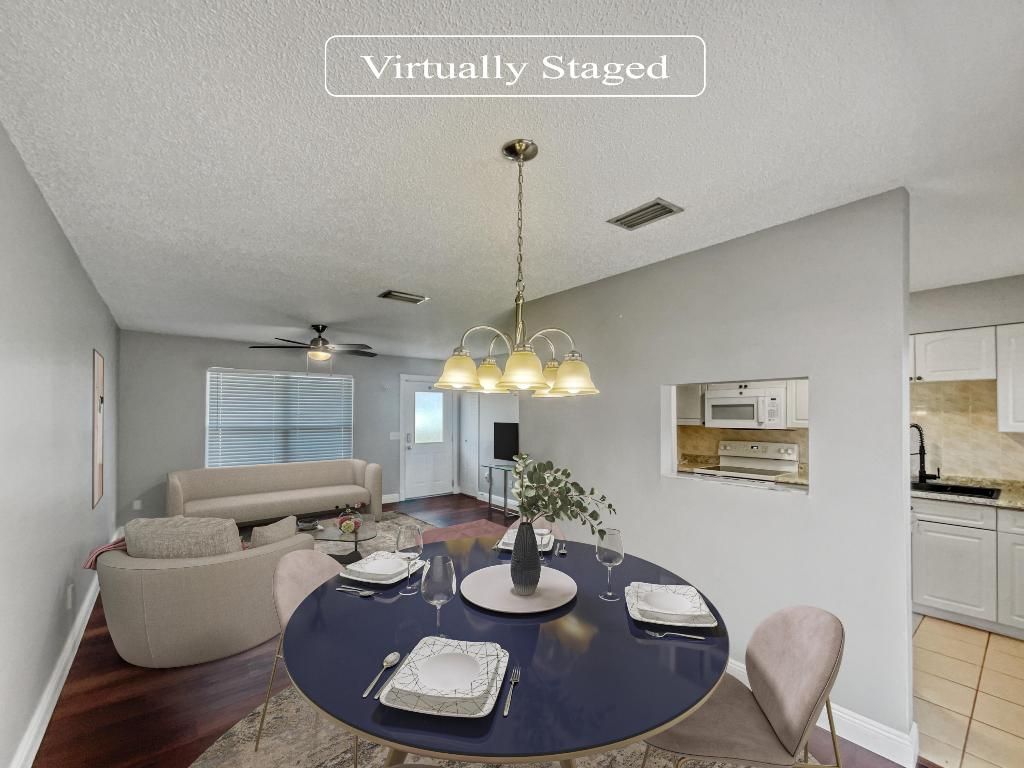 Photo of 838 SW Curtis Street, Port Saint Lucie, FL 34983 (MLS # R10969689)