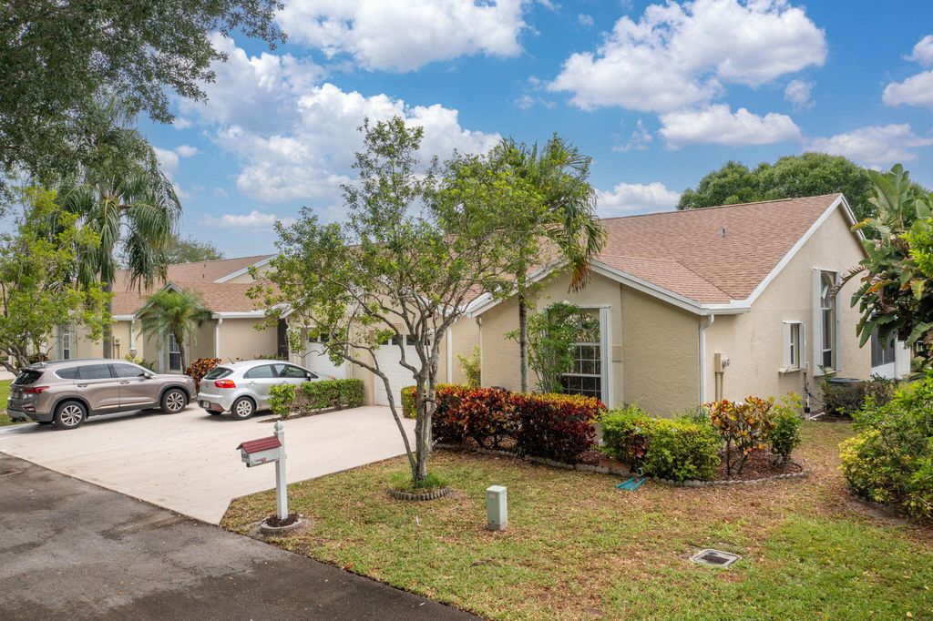 Photo of 6209 Pond Tree Court, Greenacres, FL 33463 (MLS # R11159300)