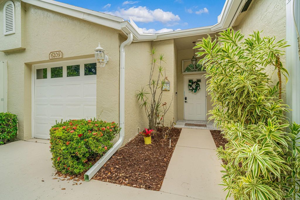 Photo of 6209 Pond Tree Court, Greenacres, FL 33463 (MLS # R11159300)