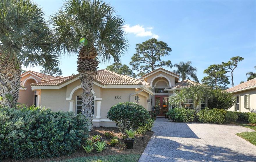 POOL HOME WITH GOLF VIEW!!!  This beautifully updated 2 br + den, 2.5 bath home in the desirable Muirfield neighborhood of  PGA Village, will ''WOW'' you as soon as you drive up.  Lush landscaping greets you and sets the stage for the beautiful interior designs in this Mid-Ocean Model.  The open floor plan lends itself to gracious entertaining, which flows out onto the covered lanai, and beyond to the heated pool and spa overlooking the lush gardens and golf course.  Views of the lake and 7th tee of the PGA Ryder golf course through the charming woodland garden, will entice you to relax & enjoy every beautiful sunset!  The updated kitchen features white cabinets, granite,glass tile backsplash, SS appliances, breakfast bar and eat-in dining area with plantation shutters, WOW!!! In addition there is a formal dining room to accommodate larger dinner parties!  The master bedroom with bay window has dual closets; master bathroom has dual vanities, separate shower and large garden tub.
There is a private guest bedroom and remodeled guest bath with granite, vanity and vessel sink as well as a den with bay window and double doors overlooking the front yard and adjacent to the powder room.
The garage has recently been updated with fresh paint on all the walls and the floor.  A handyman's (and woman's) dream come true!  This home is equipped with a central vacuum system and also boasts an indoor/outdoor speaker sound system to provide the perfect musical ambiance for your Florida lifestyle.  

This home has complete hurricane protection with accordion shutters that  close off one section of the lanai creating space for outdoor furniture storage.  Also, all windows have accordion shutters with the exception of the garage window and the office bay windows which have panel shutters.  In addition the home is wired to change over from main electrical power to generator power in the event of a power outage and the generator stays!

This home has been lovingly lived in, cared for and maintained.  The pool and spa have just been resurfaced and the pool heater was replaced in 2011.  The a/c and water heater were replaced within the past 5 years.  This property is move in ready and most furniture is negotiable!
This could be the home you have been dreaming of!  Call today to view!