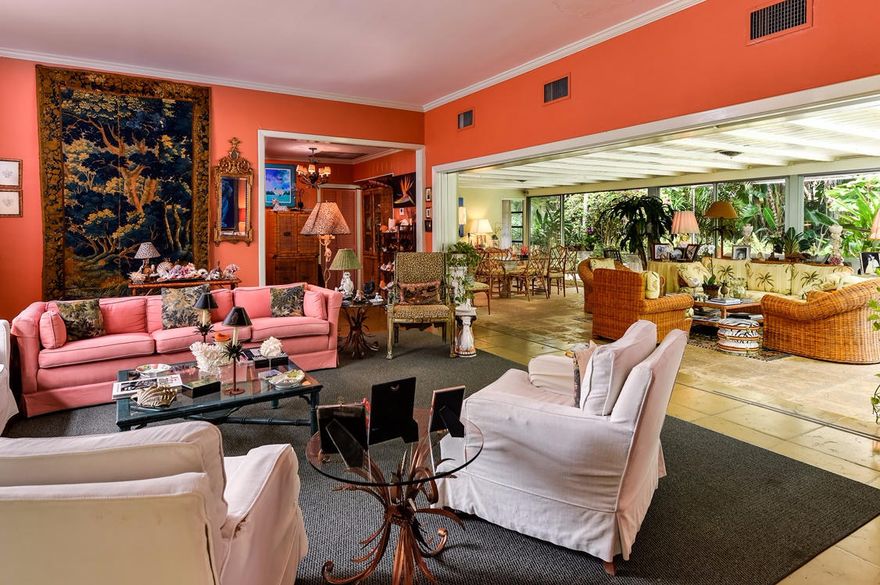 Casual, open, charming and sunlit North End home of two European artists with a lovely wild tropical garden. The south side exposure has a cozy pool area and a very romantic pond. Angler Avenue is one of the nicest and quietest streets with especially nice neighbors. The beautiful sandy beach is just within 100 yards and the bike trail is also just a stone's throw away. The lot is perfect for building your dream home or remodel the existing home to your fantasies. This property has a rare elevation for Palm Beach of over 10 feet thereby alleviating any flooding concerns.