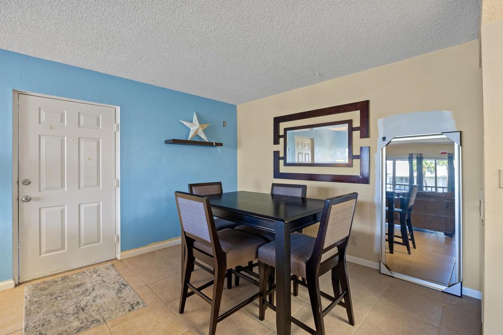 Photo of 1565 SE Royal Green Circle #208, Port Saint Lucie, FL 34952 (MLS # R11015198)
