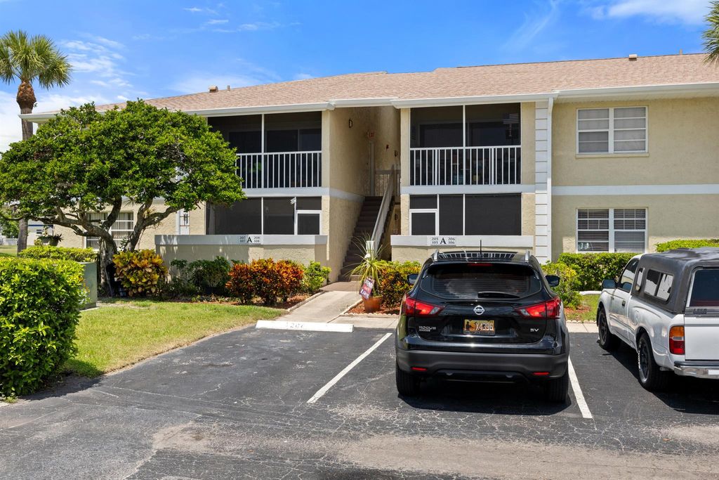 Photo of 1565 SE Royal Green Circle #208, Port Saint Lucie, FL 34952 (MLS # R11015198)