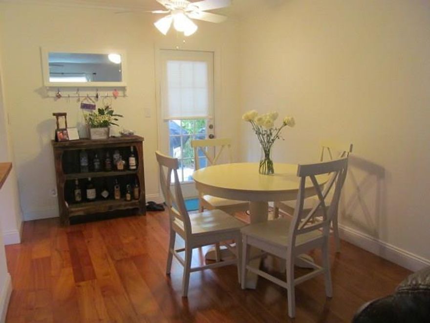 Lighthouse Point Marina lifestyle in remodeled first floor unit. Wood floors, open white kitchen, full size washer and dryer in unit. All neutral color with crown molding. Brand new A/C unit, hot water heater and refrigerator. Walk out your back  patio and bar-b-que. Walk out your front door to the pool area. Walking distance to everyone's favorite Nauti Dawg restaurant and Lighthouse Point Marina.