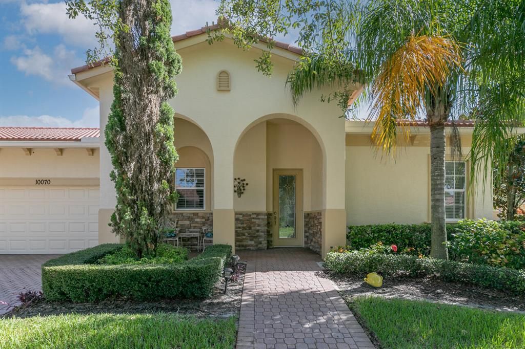 Photo of 10070 SW Dolce Road, Port Saint Lucie, FL 34986 (MLS # R10743984)