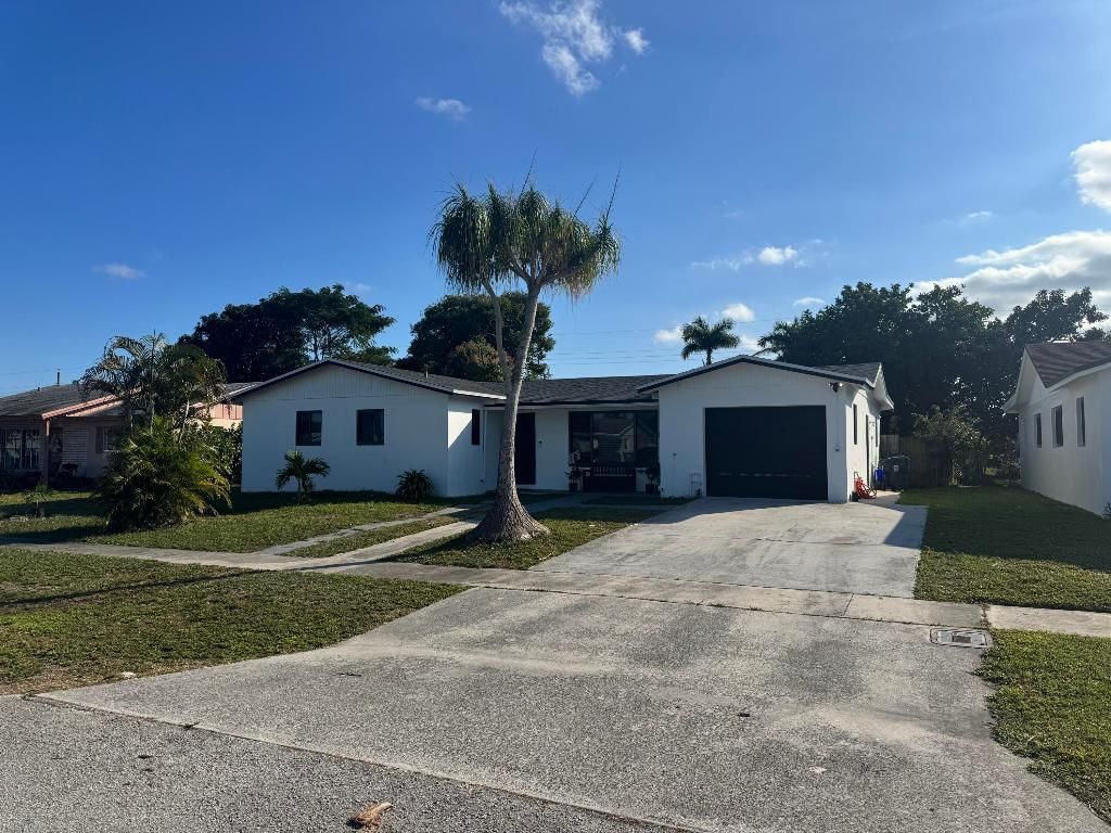 Photo of 4170 Sussex Avenue, Lake Worth, FL 33461 (MLS # R11155731)