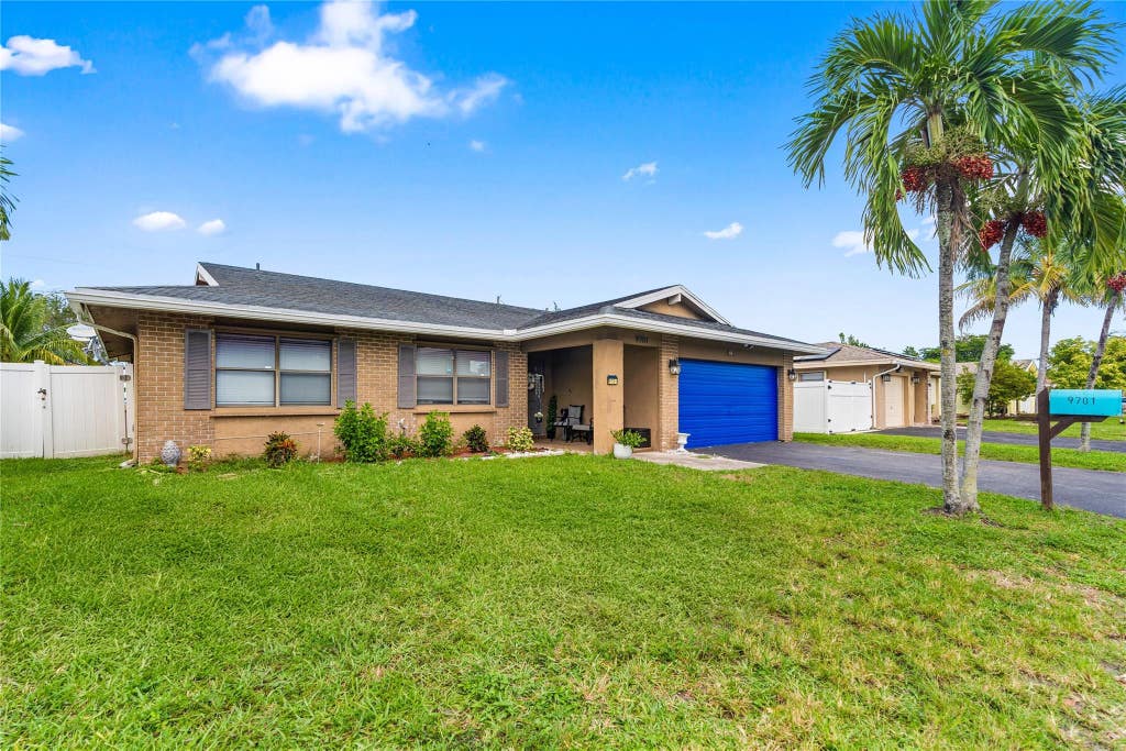 Photo of 9701 NW 83rd Street, Tamarac, FL 33321 (MLS # F10531996)