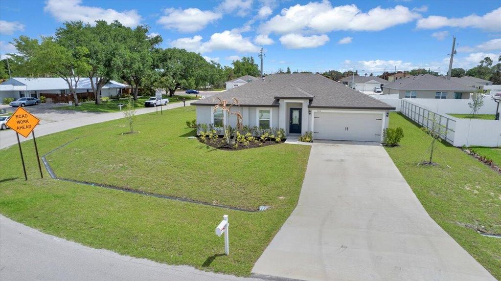 Photo of 920 SW Castaneda Lane, Port Saint Lucie, FL 34953 (MLS # B26012172)