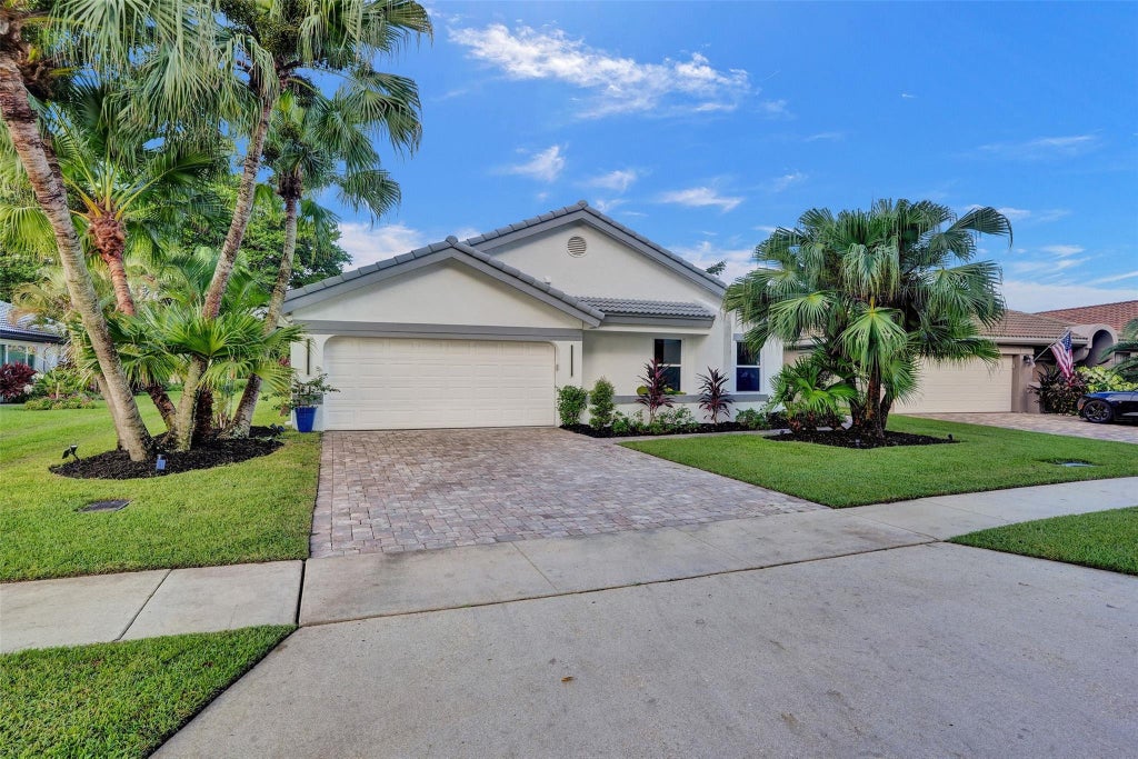 Photo of 11180 Clover Leaf Circle, Boca Raton, FL 33428 (MLS # F10459774)