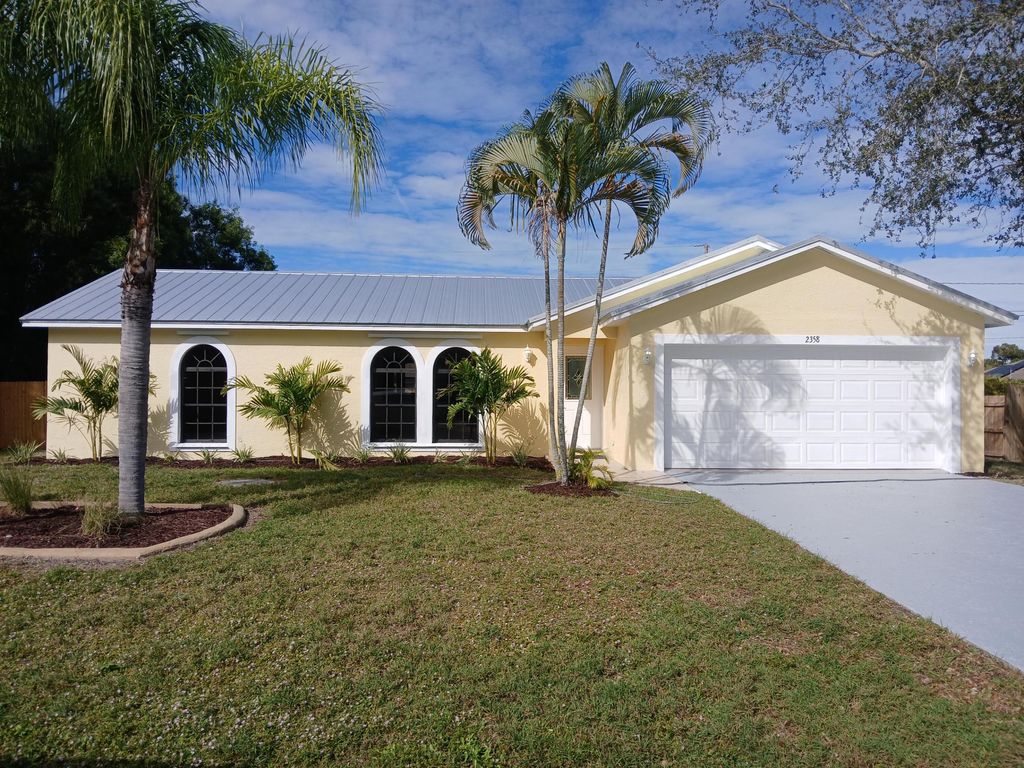 Photo of 2358 SE Heathwood Circle, Port Saint Lucie, FL 34952 (MLS # R11151015)