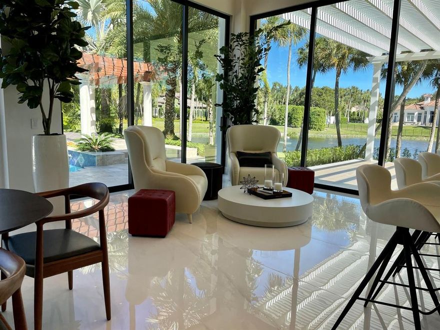 Foxe Chase is a unique privately gated community of only 43 estate homes on 1+acre lots.  This lakefront home is newly finished, only 3 miles from the ocean and Atlantic Ave. restaurants and entertainment. 5 bedrooms, en-suite baths and an office with a full bath. The luxurious master suite with pool and lake views has separate his and hers custom bath and dressing rooms with hidden vanity Smart TVs.  The fully air-conditioned 3 car plus golf cart garage opens to a spectacular mudroom, laundry and storage room.  3-zone sound system throughout the home, custom wine bar with exotic marble wine wall.  LED cove lighting keeps your eyes flowing from kitchen to living to patio bar - MUST SEE EXPERIENCE!  3 DualBand WiFi access points for seamless network, and much more for you to experience.