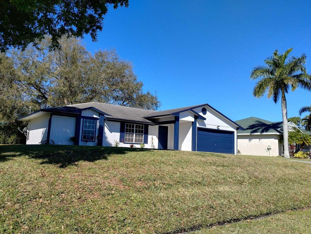 Photo of 1938 SW Cycle Street, Port Saint Lucie, FL 34953 (MLS # R10923794)