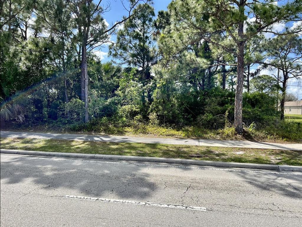 Photo of 418 NW Airoso Boulevard, Port Saint Lucie, FL 34983 (MLS # R10785338)